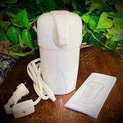 NIB, CONAIR
TRUE GLOW
HEATED LOTION DISPENSER.
WORKS WITH ANY HAND OR BODY LOTION.