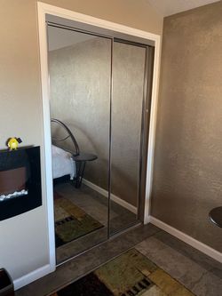 Sliding mirrored closet doors