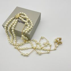 Vivienne Westwood Irregular Three Row Pearl Bas Relief Choker in gold