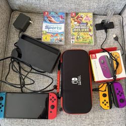 Nintendo Switch OLED  Extra Controllers & BrandNew  Game