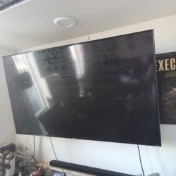 65 Inch TV Plus Wall Mount w/Remote Controller 