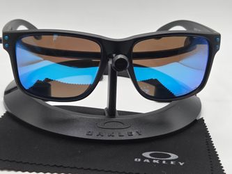 New 100% Authentic Oakley Holbrook Black frame with Blue prizm lenses and blue icons