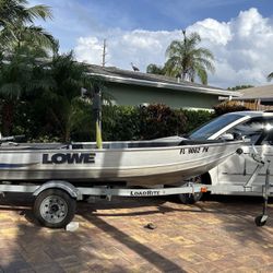 12.5 Foot Lowe John Boat With Trailer.