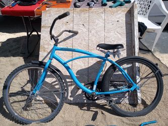 Beach cruiser bicycle with extra handle bars and seats