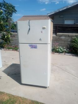 Sears refrigerator works good the bottom gets cold the top freezes