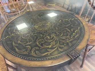 Round Glass-Top Dining Table with Ornate Pedestal Base