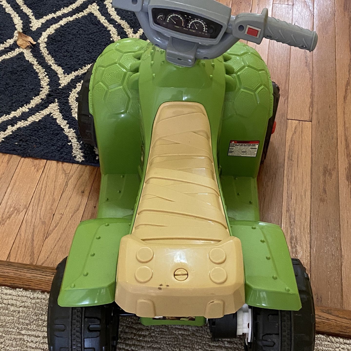 This Kid Trax Teenage Mutant Ninja Turtles 6 volt Quad Ride-on Toy features