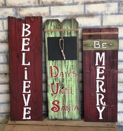 Handcrafted rustic wood Christmas signs