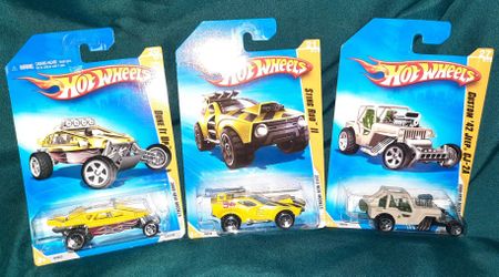 2009 Hot Wheels Dune It Up, Custome '42 Jeep CJ-2A, And 2010 Sting Rod II