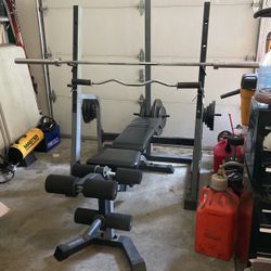 Weights, Cable Machine, Bench, And Rack. 