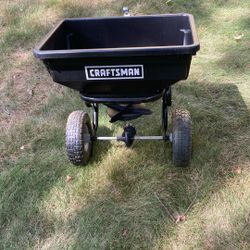 Tow behind spreader