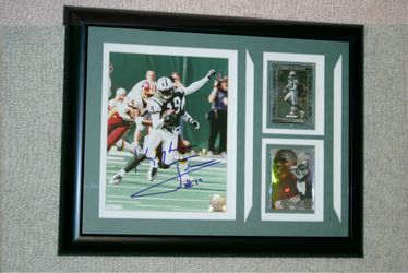 Signed and Framed 8x10 of USC Wide Receiver great and NFL Star Keyshawn Johnson