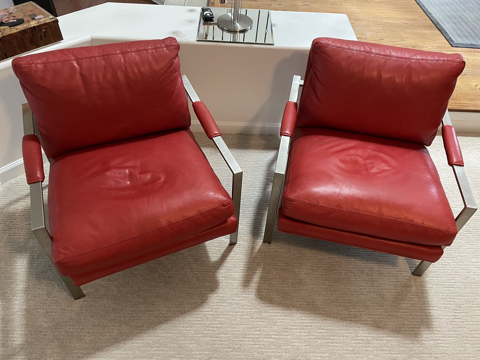 MCM Thayer Coggin Classic Design red leather chairs with brushed metal frame.