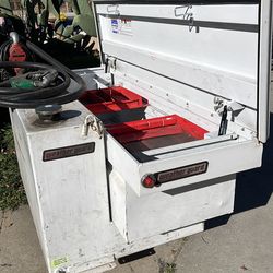 Weather Guard truck toolbox combined with an L-shape transfer tank