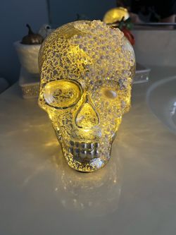 Beautiful glass skulls, two pack brand new lights up pearls