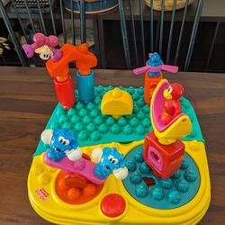 FISHER-PRICE "POP-ONZ POP'N TWIRL SPIN MUSICAL BUILDING TABLE" 