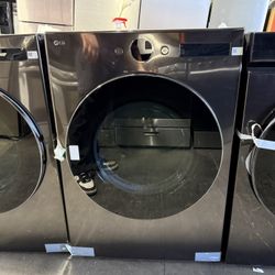 new open box LG 7.4 cu. ft. Vented Stackable SMART Gas Dryer in Black Steel with TurboSteam and AI Sensor Dry Technology