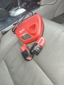 2 Milwaukee M12  12v 2.0amp Battery with A Charger!