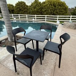 Metal Table & Plastic Chairs