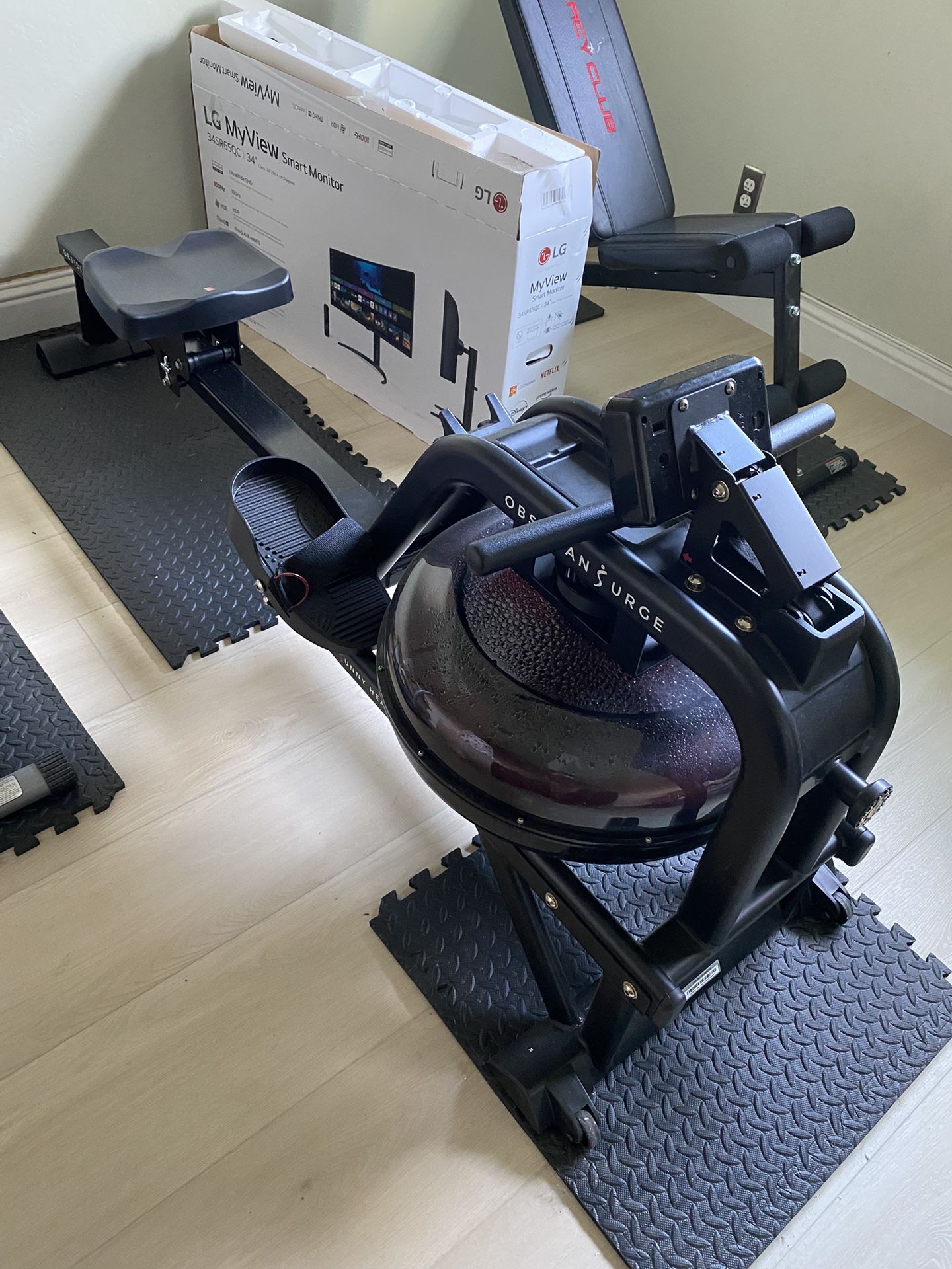 Sunny Health & Fitness Obsidian Surge Water Rower Machine