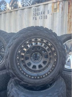 20” take off set American out law wheels wrapped in 275/65/20
