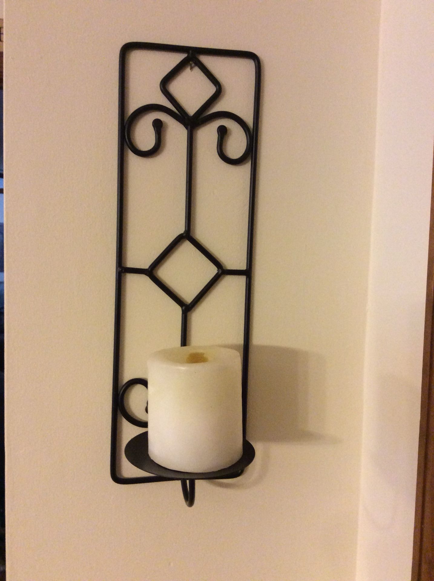 Wrought iron candle holder
