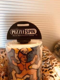 Vintage Puzzle Spin Hand-held picture game (4) Available (2) are the same, it may be similar to Rubik’s cube ( 1 for $12,) 2 for $20 or (4 for $32