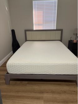Queen size bed frame only  with headboard ( no mattress)