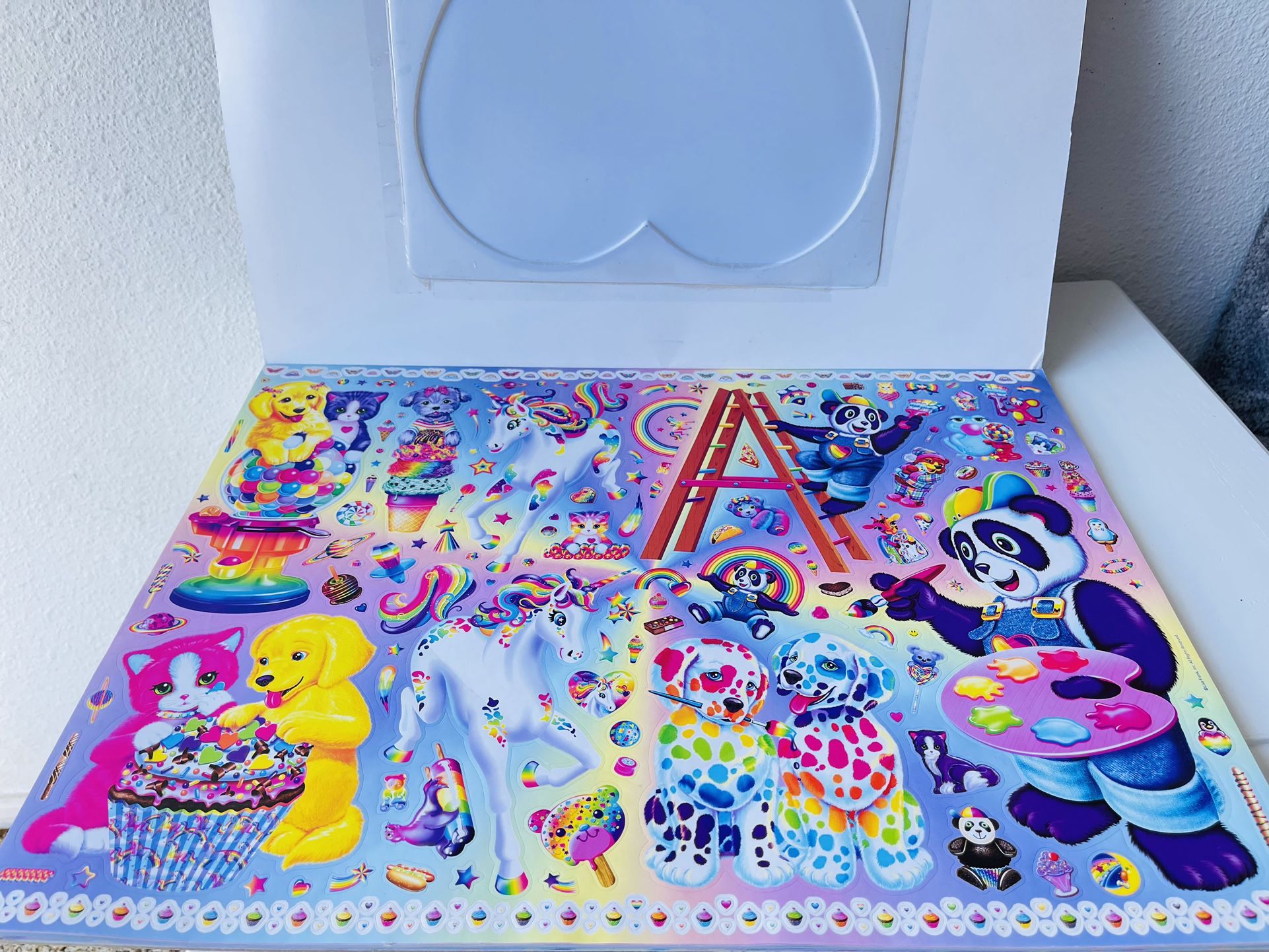 Lisa Frank Giant Sticker Activity Pad 2000+ Stickers, 10 Sticker Sheets, 15  Interactive Play Scenes, 25 Design Pages (Deluxe Set) for Sale in Seal  Beach, CA - OfferUp