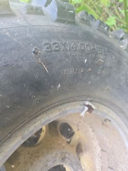 ONE 33" 12.5 -15 bogger 70% on jeep rim