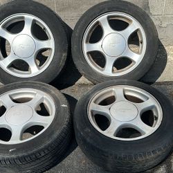 Ford Mustang 16 inch aluminum wheels and tires 5 on 4.5 inches