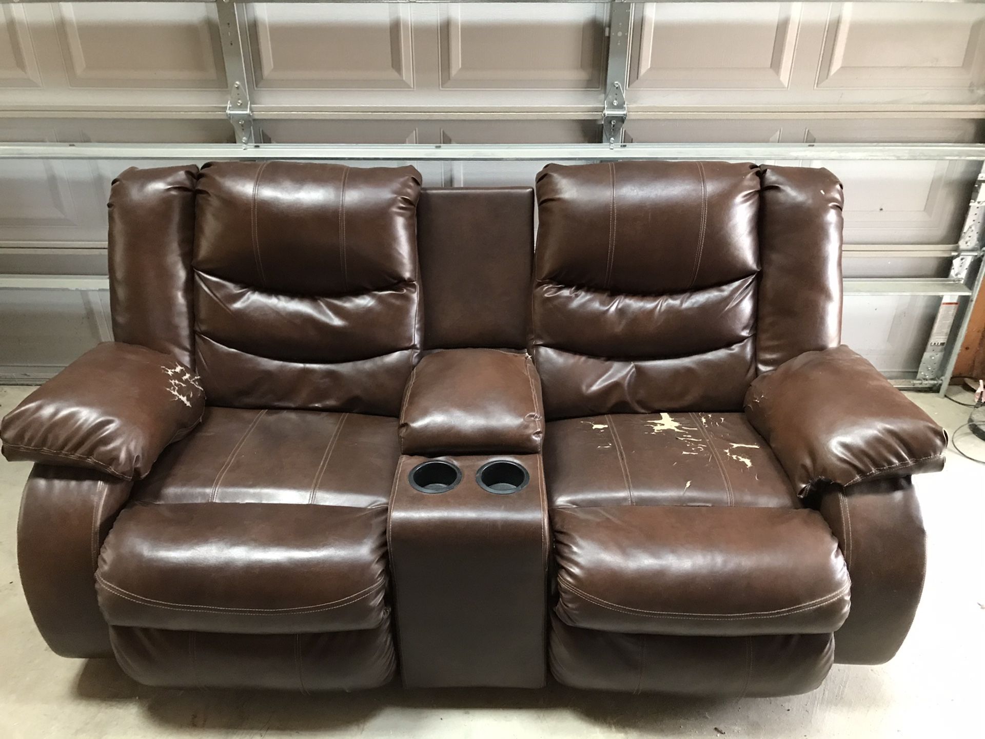 Dual Recliner Couch with center console.