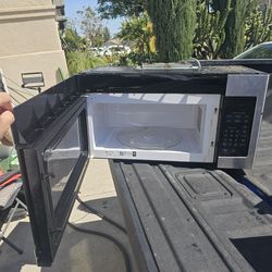 Free Under cabinet microwave Works Good Just Needs Needs handle and some cleaned