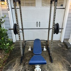 Squat Rack, Weight Bench, Plates, And Bar