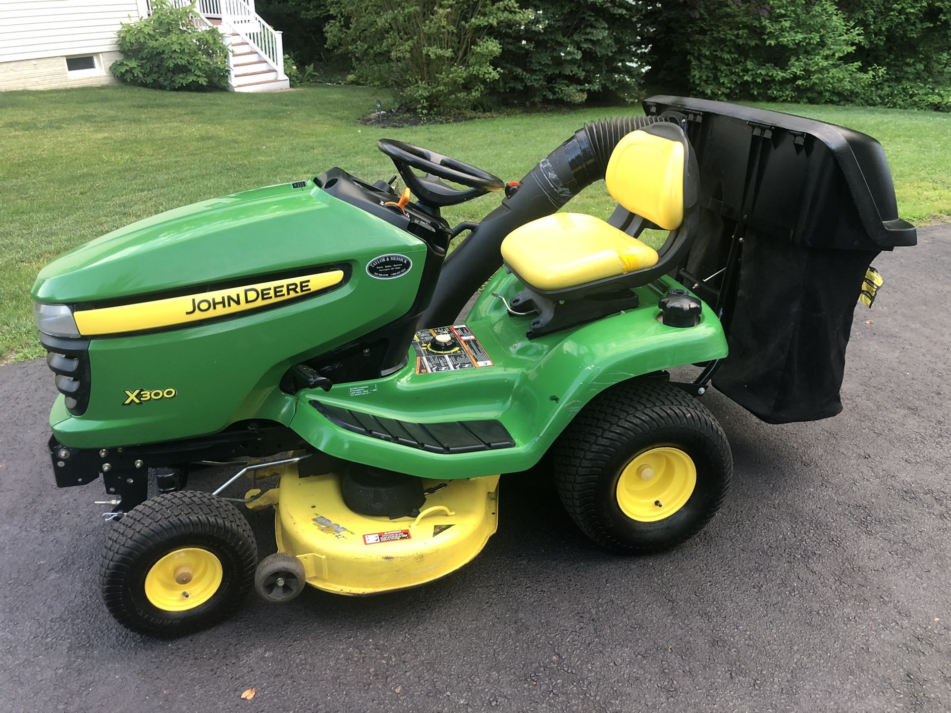 John Deere X300 42" Riding Mower with 2 Bin Bagger and Delivery
