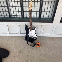 Squire Stratocaster + Boss DS-1 Pedal