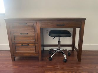 Room to go desk with swivel chair