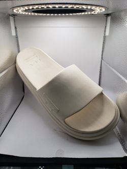 Size 11, pair of cream Billabong platform slide sandals