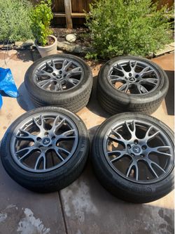 19” staggered Tesla tempest wheels & continental tires