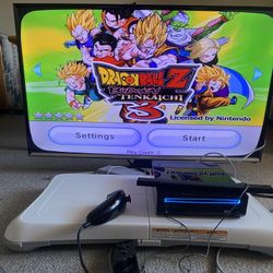 Nintendo Wii + Games
