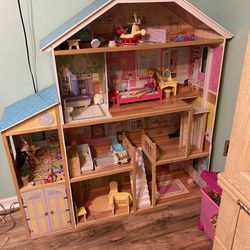 Doll House And Barbie Dolls Including accessories . Like New!. SE Palm Bay Area