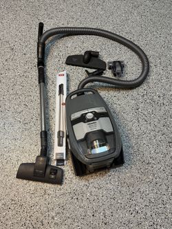 Miele Blizzard CX1 w/ Bagless Canister Vacuum