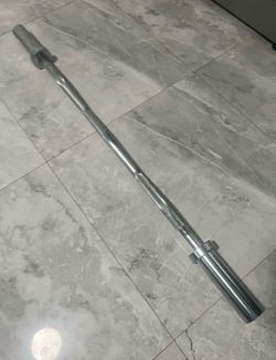 Cash only no Zelle new ez curl bar barbell for Olympic weights plates 4 foot curl bar it is not a straight bar have other gym items check my page