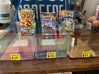 Pokémon TCG Booster Packs Surging Sparks, Pitch Black and Chaos Rising
