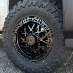 18x9 KMC Rims And Tires 35/1250/18 Toyo MT