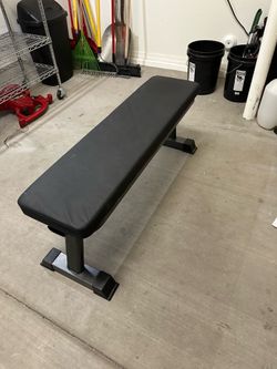 Flat workout bench and weights home gym
