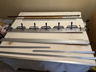 60” metal fabric clamps, straight edge cutting guide, measuring rulers for sewing cutting table
