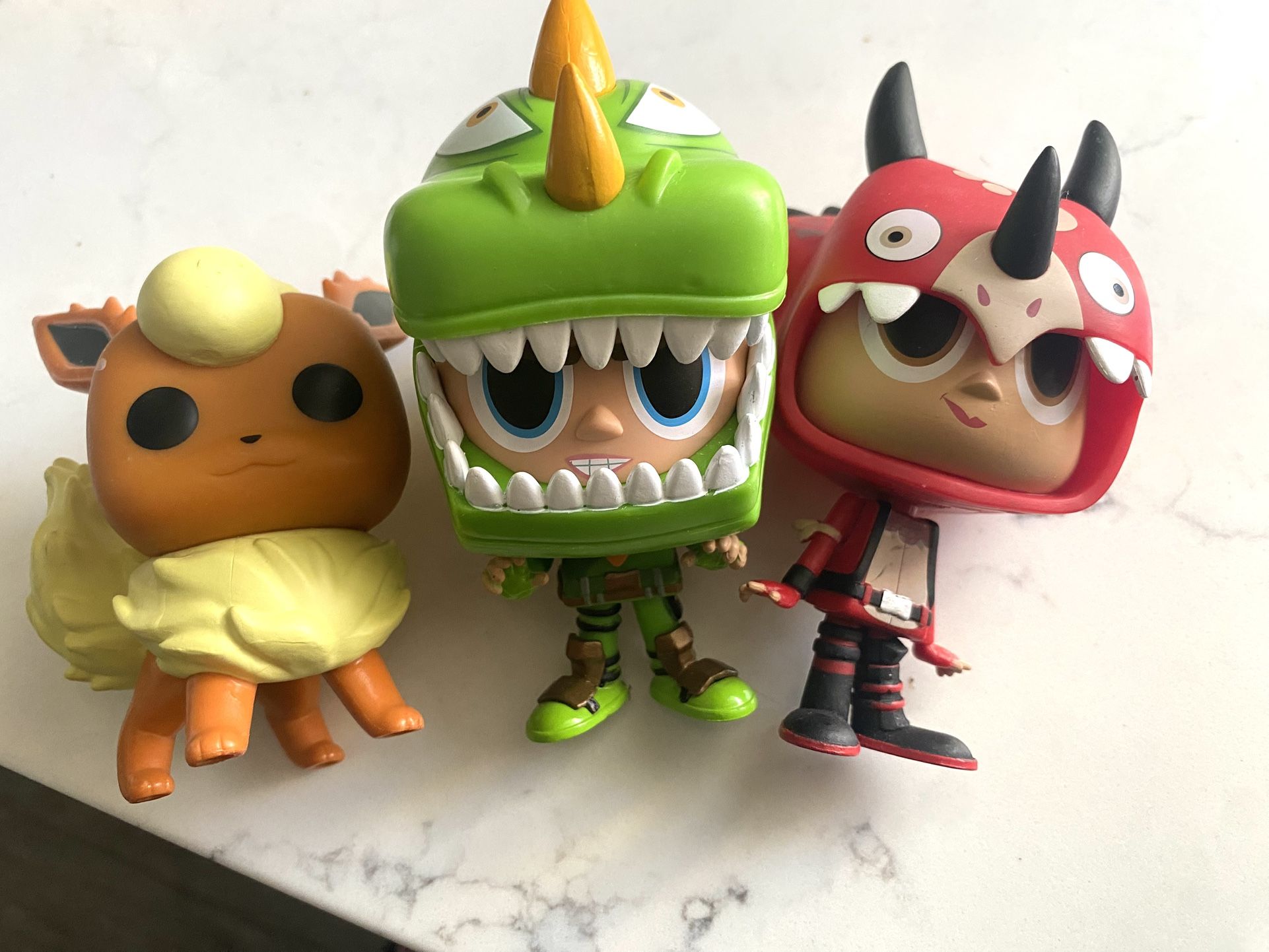 Lot of 3 Funko Pop Characters Pokémon & Fortnite- all played with no boxes