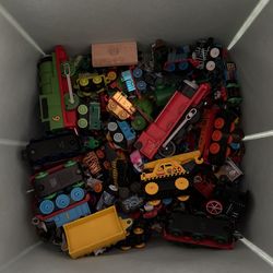 Box Full Of Thomas Minis And Larger Plastic Models