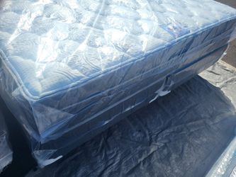Brand New King Size pillowtop mattress and box spring Free Delivery depends on location